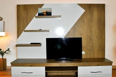 a living room with a tv and a staircase at Mimoza İstiklal Apart Hotel in Istanbul