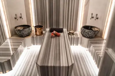 a table with three vases on top of it at Four Points by Sheraton Istanbul Kagithane in Istanbul