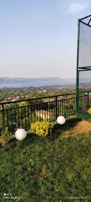 a fence with some frisbees on the grass at Sapanca villa in Sapanca