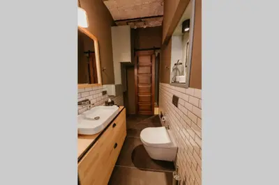 a bathroom with a toilet and a sink at Galadoo Suites 2nd Floor in Istanbul