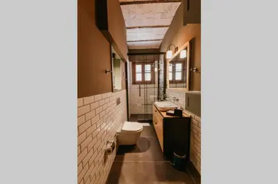 a bathroom with a toilet and a sink at Galadoo Suites 2nd Floor in Istanbul