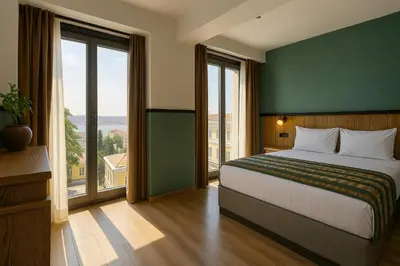 a bedroom with a large bed with a green wall at Fragments Hotel in Istanbul