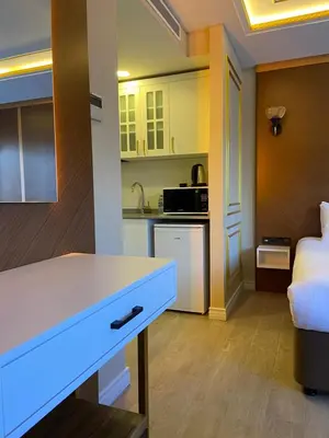 a kitchen with a white counter top in a room at Ak residence in Istanbul