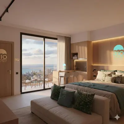 a bedroom with a bed and a couch and a balcony at Rio Suite Hotel in Istanbul