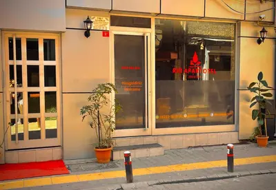 a store front with a sign in the window at Rio Suite Hotel in Istanbul