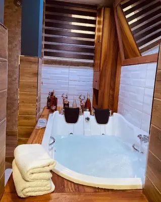 a bathroom with a large tub in a room at Rio Suite Hotel in Istanbul