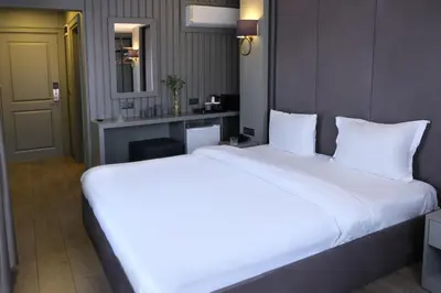 a large white bed in a hotel room at Dilens Bosphorus Hotel in Istanbul