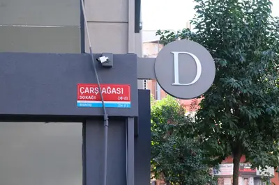 a sign on the side of a building with a d sign at Dilens Bosphorus Hotel in Istanbul