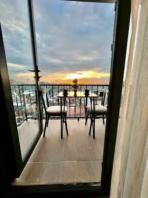 a view of a balcony with a table and chairs at Taksim Larissa hotel suites in Istanbul