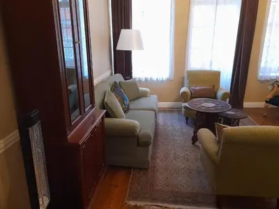 a living room with a couch and chairs and a table at Agus Flats Galata in Istanbul