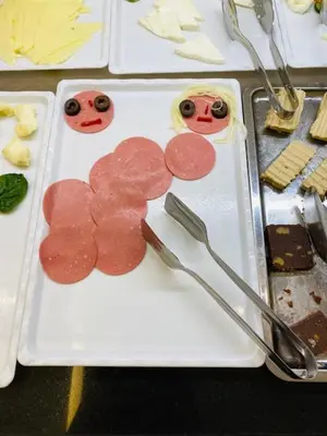 a plate of food with meat with faces on it at The Biancho Hotel Old City - Special Category in Istanbul