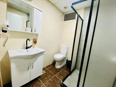 a bathroom with a sink and a toilet at Airport Best Hotel in Istanbul