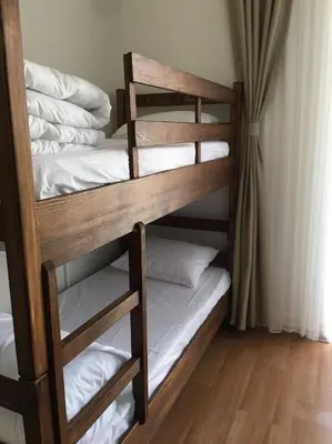 a stack of bunk beds in a room at Kalkedon Plus in Istanbul