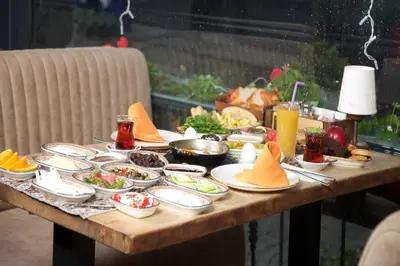 a table topped with plates of food on a table at La Vida Old City Hotel in Istanbul