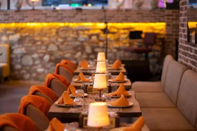 a row of tables in a restaurant with food on them at La Vida Old City Hotel in Istanbul