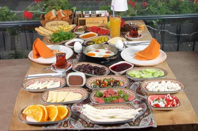 a table with many plates of food on it at La Vida Old City Hotel in Istanbul