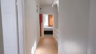 a hallway with a room with a bed in it at Simon Hotel in Istanbul