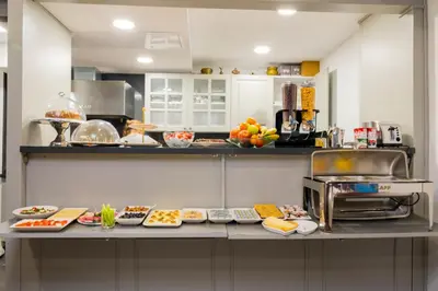 a kitchen with several plates of food on a counter at 9 Doors Hotel in Istanbul