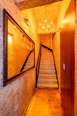 a staircase in a building with a chandelier at The First Ottoman Dream in Istanbul