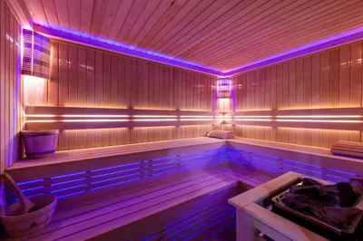 a sauna with purple lights on the inside of it at Aprilis Deluxe Hotel in Istanbul