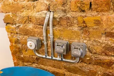 a stone wall with a bunch of electrical equipment at Ganbaru Tours - Private Triplex&Duplex in Istanbul