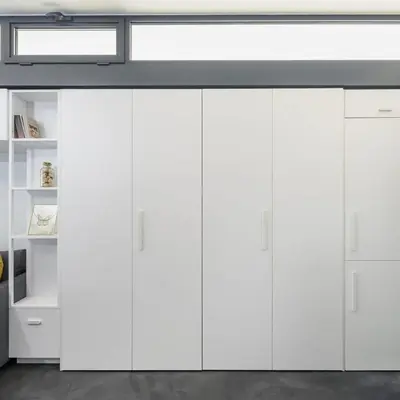 a white kitchen with white cabinets and a ceiling at Newly Designed Central Modern Smart Duplex! #143 in Istanbul