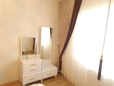 a bathroom with a white sink and a mirror at King Suite WH32 in Istanbul