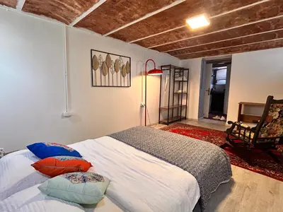 a bedroom with a bed with pillows on it at Nevalist Hotel in Istanbul