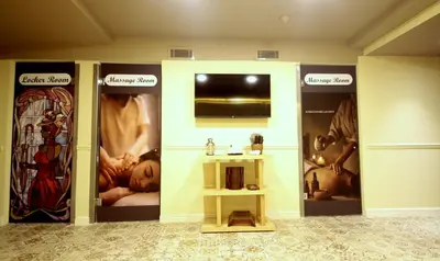 a room with a sink and some pictures on the wall at Villa Paradiso Hotel & Spa in Istanbul