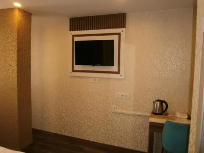 a room with a flat screen tv on the wall at Nos Istanbul in Istanbul