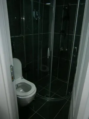 a bathroom with a shower and a toilet at Nos Istanbul in Istanbul