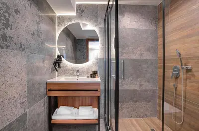 a bathroom with a sink and a shower at Depiero Hotel Karaköy in Istanbul