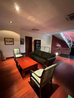 a living room with a couch and a table at Silivri Gazitepe'de 3 katlı, havuzlu lüks villa in Silivri