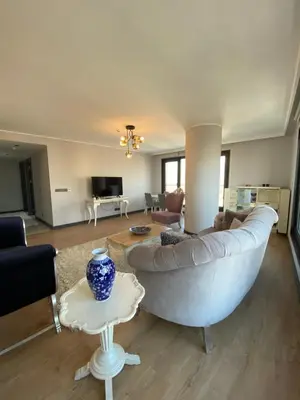 a living room with a couch and a table at Luxury Central Fully Equipped 3BR 2BA Apartment by Siena Suites in Istanbul