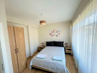 a small bedroom with a bed and a window at Kuzguncuk View in Istanbul
