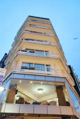 a tall building with glass windows at HOTEL EURO DIAMOND in Istanbul