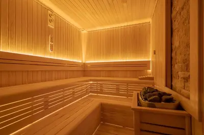 a walk in sauna with a bowl of rocks at ERTA SOYAK THERMAL OTEL in Çekirge