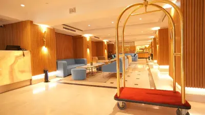 a lobby with a waiting room with chairs and tables at Dosso Dossi Hotels Old City in Istanbul