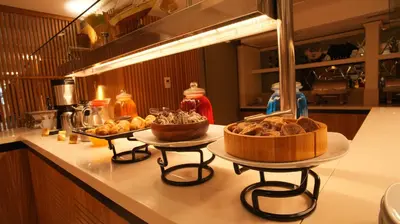 a kitchen counter with two trays of food on it at Dosso Dossi Hotels Old City in Istanbul
