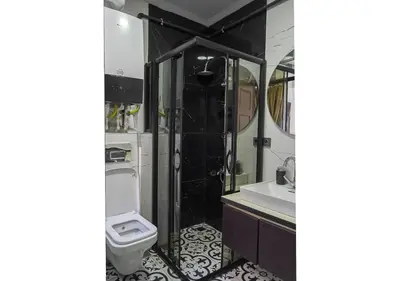 a bathroom with a toilet and a sink at Mar Suite in Istanbul