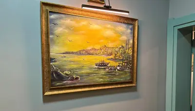 a painting of a painting of a city on a wall at By Kinyas Hotel in Istanbul