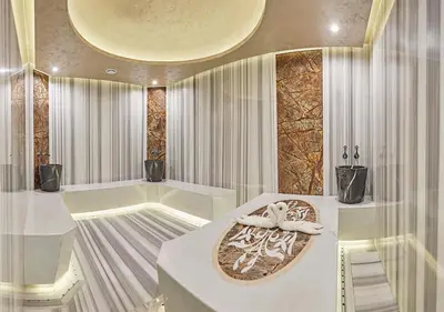 a room with a table with a bowl on it at THE HUBİ HOTEL in Istanbul