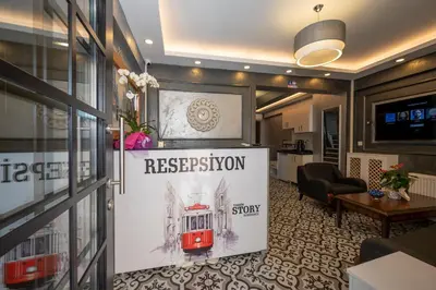 a lobby with a sign for aresurrection station at Taksim Story Residence in Istanbul
