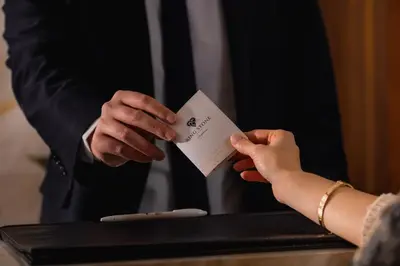 a person is holding up a piece of paper at Ring Stone Hotels Bosphorus - Special Class in Istanbul