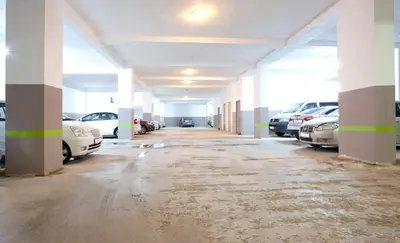 an empty parking lot with cars parked in it at Sefa Hotel 2 Çorlu in Corlu