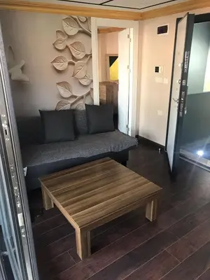 a living room with a couch and a coffee table at Middle Village in Istanbul