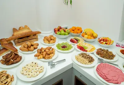 a table topped with lots of different types of food at Hotel Nena Sultanahmet in Istanbul