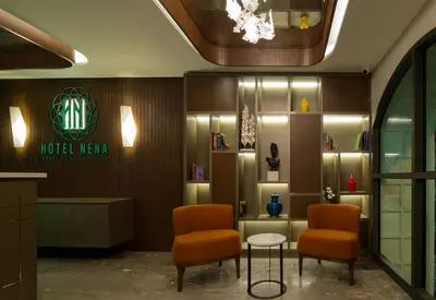 a lobby of a hotel with two chairs and a table at Hotel Nena Sultanahmet in Istanbul