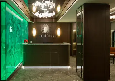 a lobby of a hotel with a green wall at Hotel Nena Sultanahmet in Istanbul