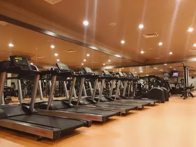 a row of tread machines in a gym at Eresin Hotels Topkapı in Istanbul